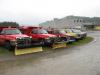 View of Trucks with plows