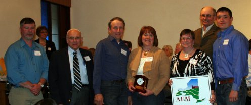 L-R: Brian Davis, Cattaraugus County Soil & Water Conservation District; Crystal Abers, Director of EDP&T; David Zilker, Chairman Agricultural and Farmland Protection Board; Dave, Joyce, Lynn, Don and Michael Telaak - Farmer of the Year Award